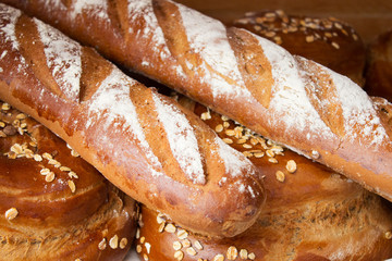 Traditional French baguette and bread on the table. Selective focus.