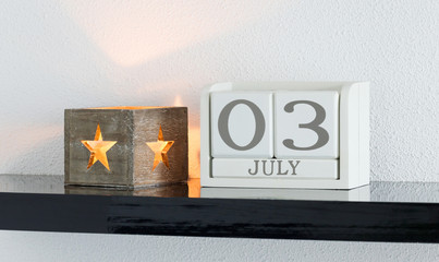 White block calendar present date 3 and month July