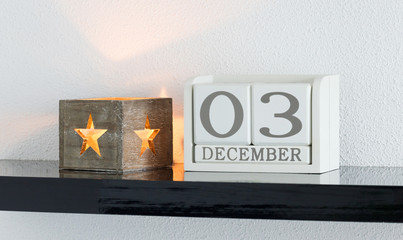 White block calendar present date 3 and month December