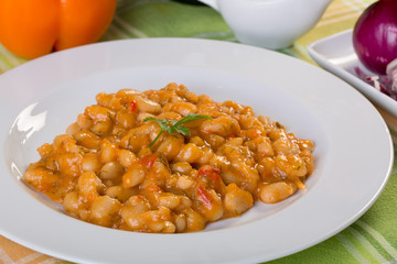 clopse up of cooked beans with ingredients
