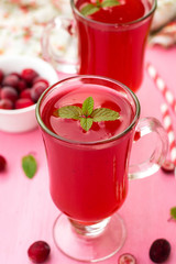 Russian traditional drink kissel with cranberries and mint