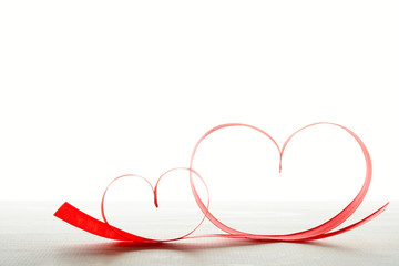 Heart shaped ribbons on table