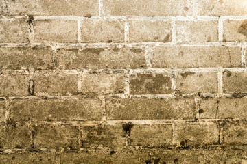 Brick old vintage grunge wall with cracks close-up texture background