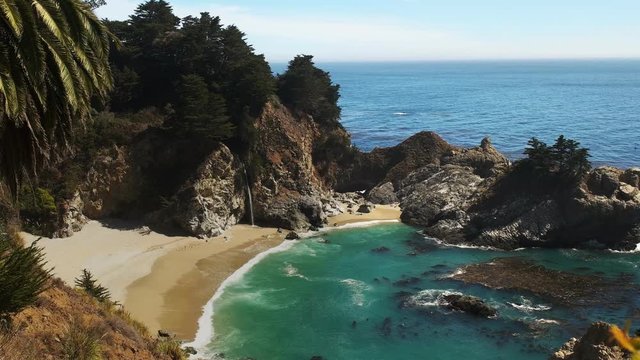 panning shot of mcway falls at julia pfeiffer burns state park on highway 1 along the california coast in big sur