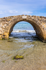 The Venetian Bridge of Argassi in Zakynthos. The bridge is a sightseeing location that many tourists visit. Zakynthos island in Greece, Ionian Sea.