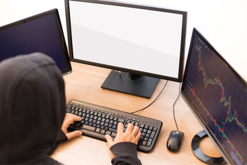 Unidentified person and blank computer screen