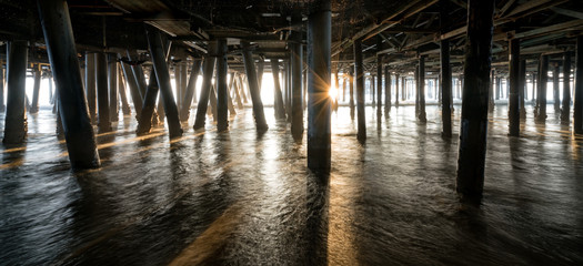 sunset under the pier