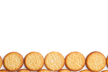 Mini round cheese biscuit savoury snacks on a white background