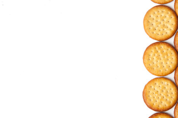 Mini round cheese biscuit savoury snacks on a white background