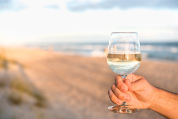 Offering wine on the beach