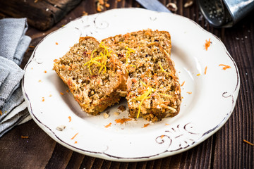 Slices of carrot cake served for Easter celebration.