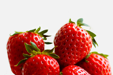 Juicy red strawberries close. Delicious berries are full of vitamins. Dessert fruit food.