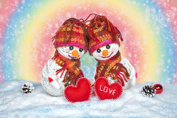 Love snowmen. Snowfall. Love concept. Valentine's Day Greeting card