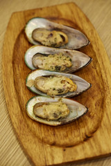 mussels baked with parmesan and herbs