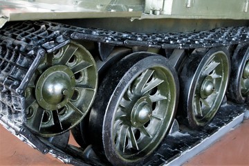 Obraz na płótnie Canvas The Caterpillar Track of a Military Tank 