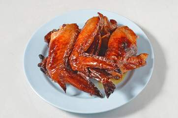 Grilled chicken wings  on a plate    