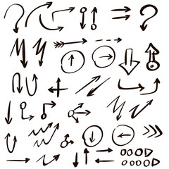 Arrow doodles vector. A set of simple sketches of arrows. Up, down, left, right ones. The effect of a pencil sketch isolated on white background.. Vector eps 10.