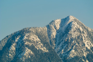 snow covered mountain under the sun