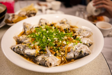 Fototapeta na wymiar Taiwan's famous seafood restaurant in Taipei, the restaurant steamed sea fish, is a must-have dinner dishes, fresh and delicate taste