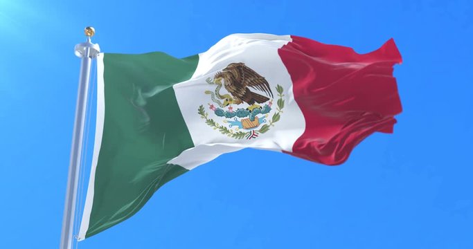 Mexican flag waving at wind with blue sky, loop