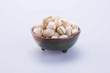 nuts. pistachios on the background