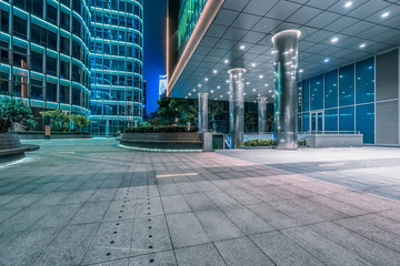 empty brick road nearby office building in shanghai, china