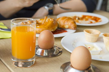 Bright and healthy breakfast, raw vegetables salad, fresh lettuce, cheese shakes, Western fried egg with the original bread,