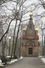 Fototapeta na wymiar Gomel, Belarus - December 28, 2017: Peter and Paul Cathedral in the city park.