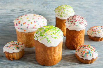 Homemade Easter Bread and eggs on the wooden background. Easter Cake - Russian and Ukrainian Traditional Kulich. Selective focus.