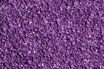 Asphalt texture in purple color.