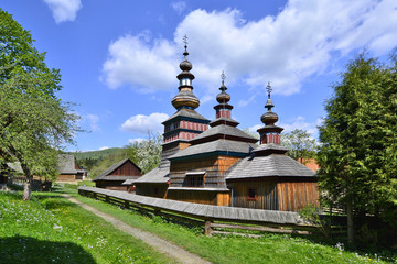Fototapeta na wymiar Greek catholic wooden church in open air museum, Bardejovske Kupele, Slovakia