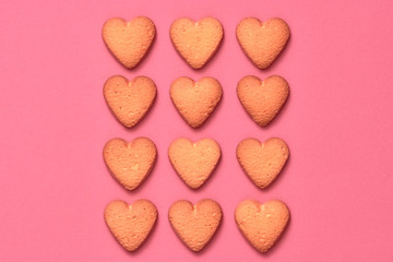 Cookies Hearts background. Valentines Day. Love set. Vanilla Pastel Color. Trendy fashion Style. Layout. Homemade Cookies on Pink, biscuit Dessert. Minimal. Art