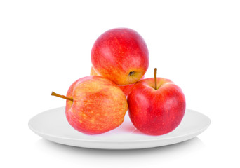 Apples in white plate on white background