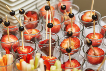 Catering food table of appetizers, snacks and canapes