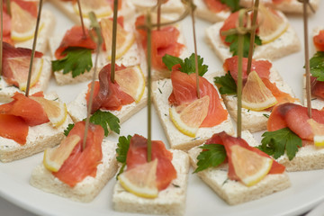 Catering food table of appetizers, snacks and canapes