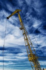 small crane mounted on a river ship