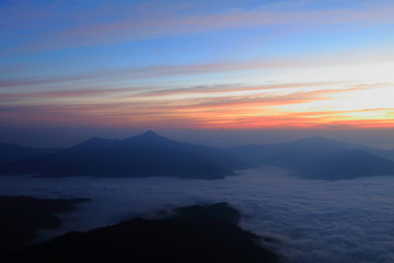 Fototapeta na wymiar Twilight and fog in mountain