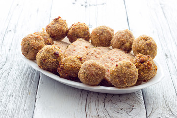 Fried meat meatballs in oil