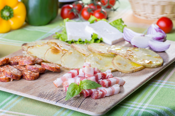 close up of traditional pork food with potatoes