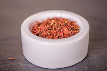 Fototapeta premium saffron raw organic dried Saffron in a spoon selective focus, macro shot, shallow depth of field