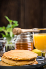 Healthy brunch with pancakes and juice.