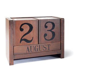Wooden Perpetual Calendar set to August 23rd