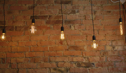  Retro lamp on a brick wall
