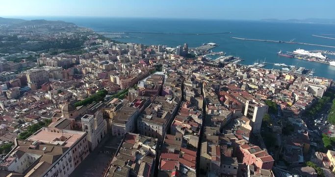 CAGLIARI, SARDINIA, ITALY  – JULY 2016 : Amazing aerial shot over Cagliari landscape on a beautiful day with sea and cityscape in view
