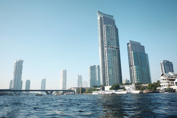 Fototapeta na wymiar High-rise building in the capital of Thailand. Near the Chao Phraya River