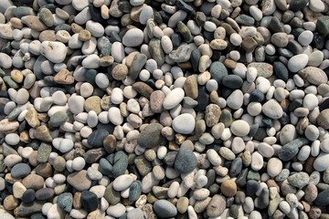 Beach stones background. Top view.
