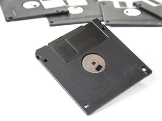 Old floppy disks for computer on the white