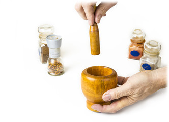 Wood mortar with pestle on the white background