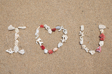 I Love You made from shell on sandy beach. Concept of dating and romantic feeling