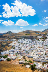 Colorful view of Lindos village and its traditional white architecture (Rhodes, Greece)